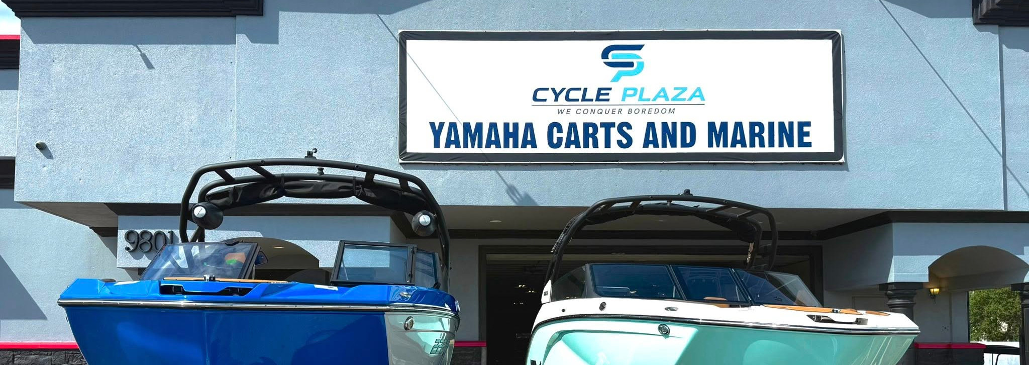 Image of two Yamaha boats in front of powersports dealer Cycle Plaza - Yamaha Cart and Marine